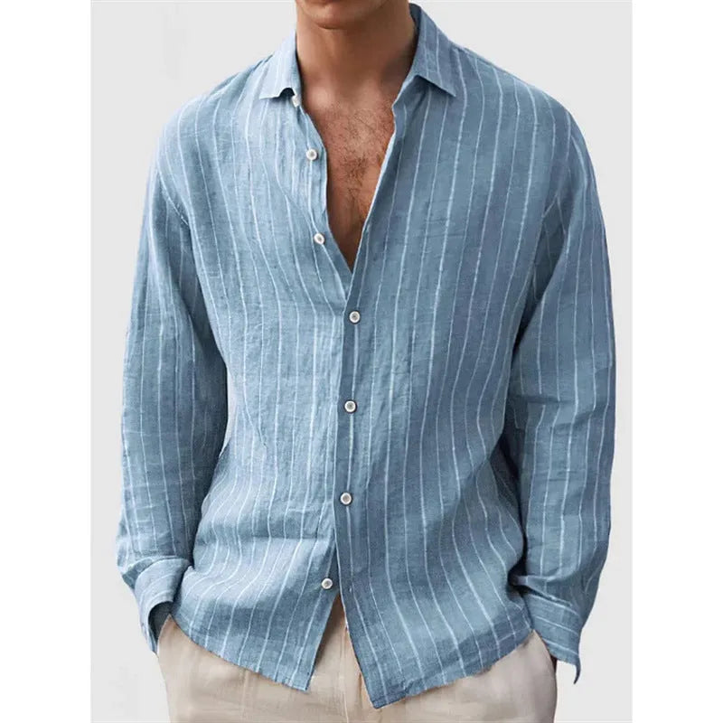 Man wearing a loose-fit striped long sleeve cardigan-style shirt in a casual setting.