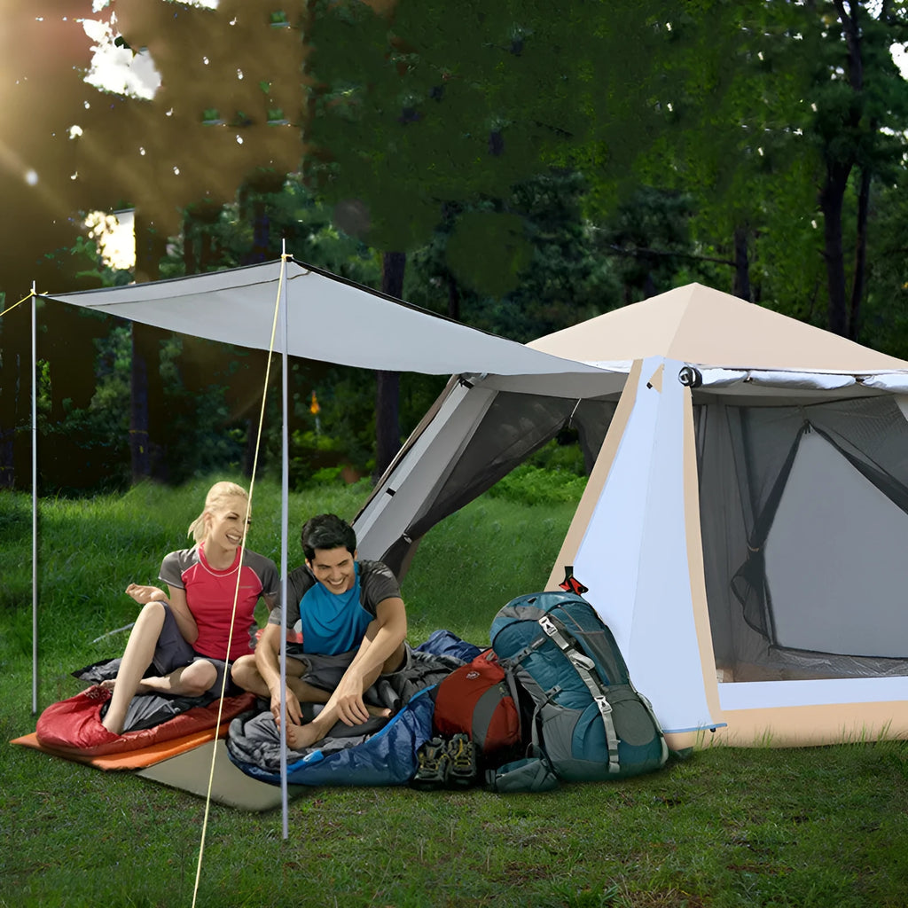 White fully automatic quick-open camping tent with aluminium poles, double-layer construction, pitched outdoors in a field