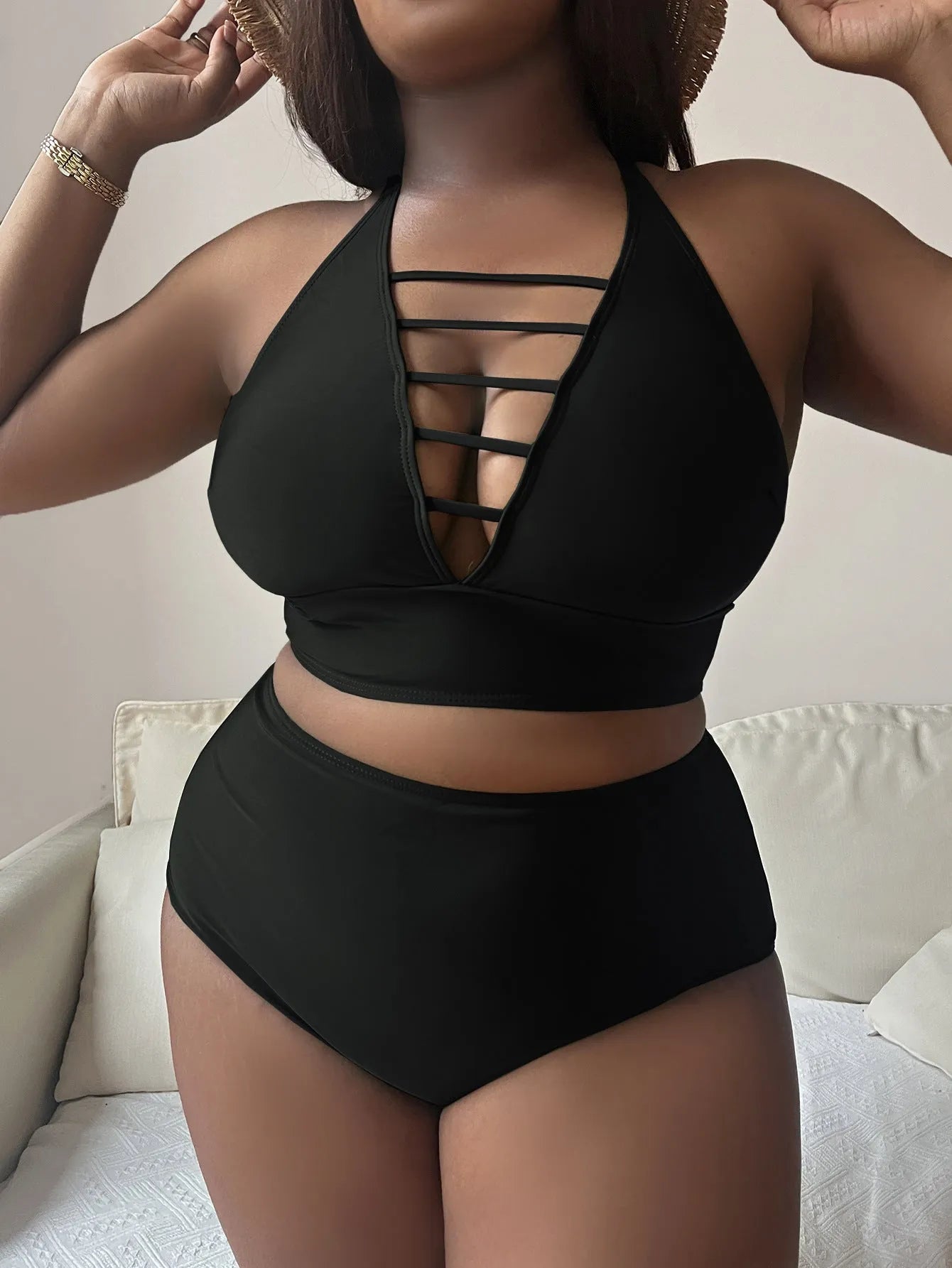 Plus size women's black bikini with adjustable halter top and high waist briefs