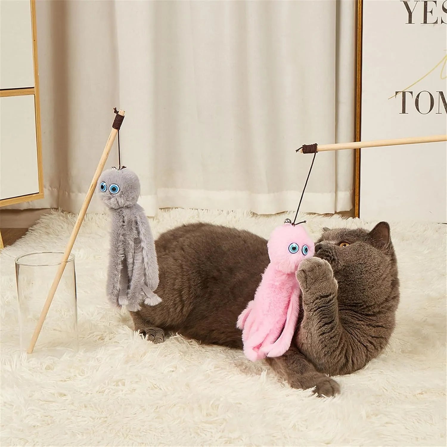 Octopus-themed cat toy with long stick in bright colours for indoor kitten play