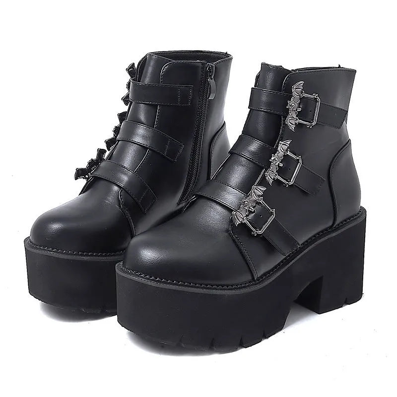 Black ladies punk Martin boots with bat buckle, thick heel, side zip, and round toe.