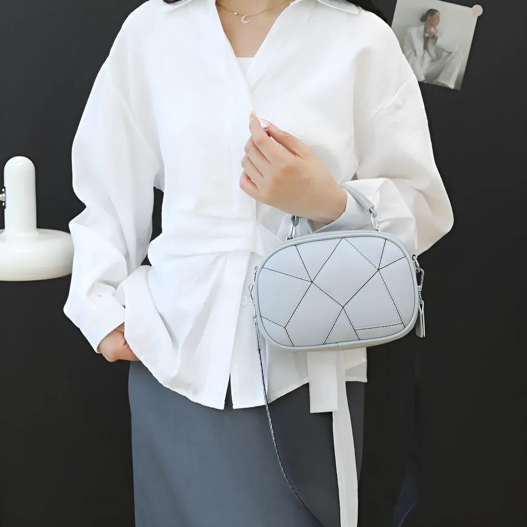 Round grey retro patchwork small bag with visible stitching, 20x15 cm size.