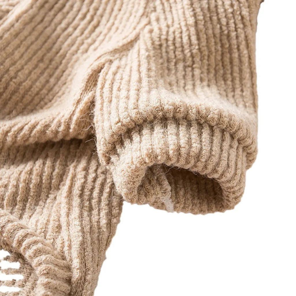 A brown knitted pullover sweater for a small dog on a mannequin.