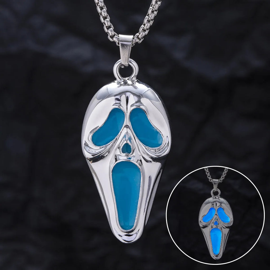 Exaggerated skull luminous mask pendant necklace on square pearl chain, available in luminous blue, luminous green, and hollow out colours