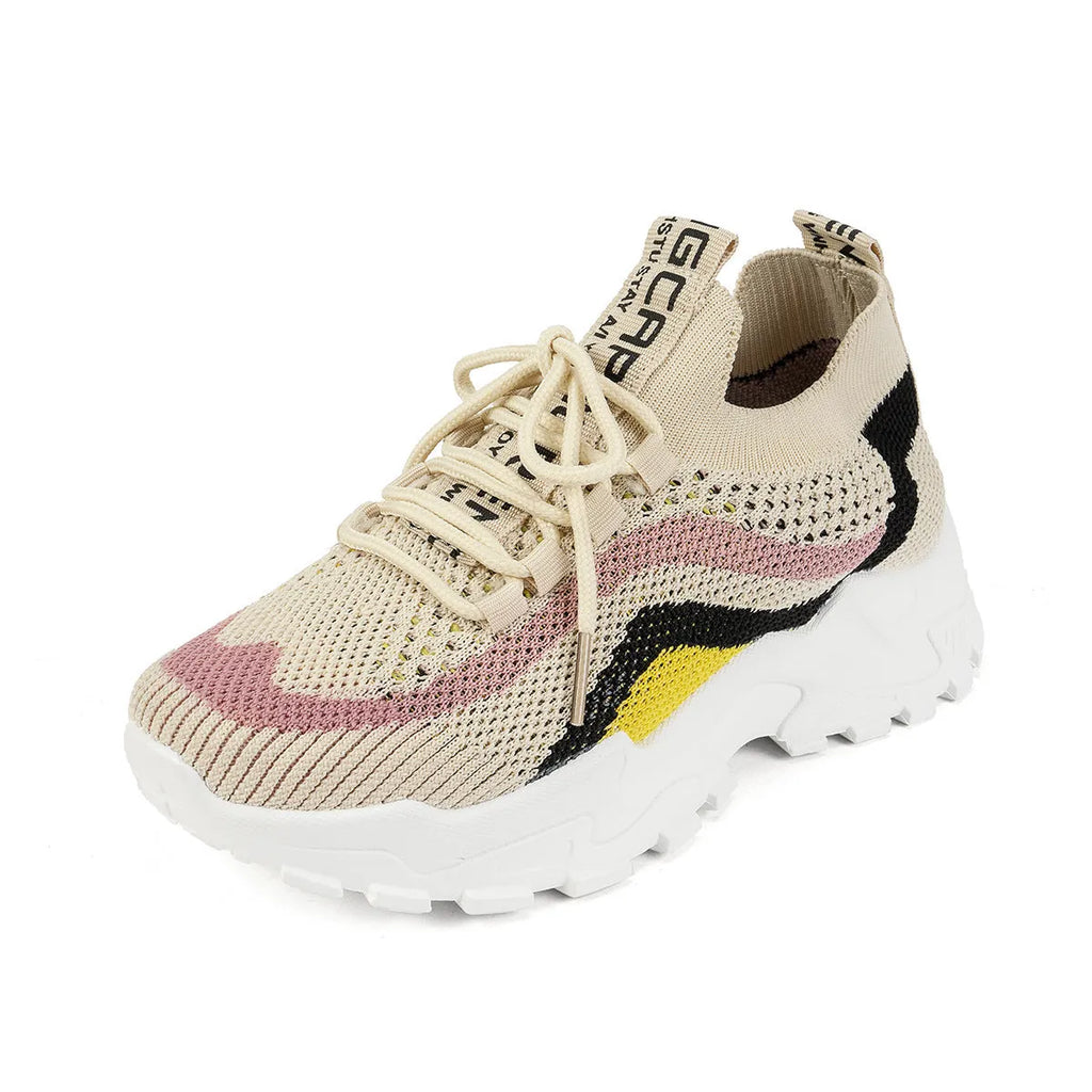 Women's casual sports shoes with mesh upper and front lace-up in black and white colour