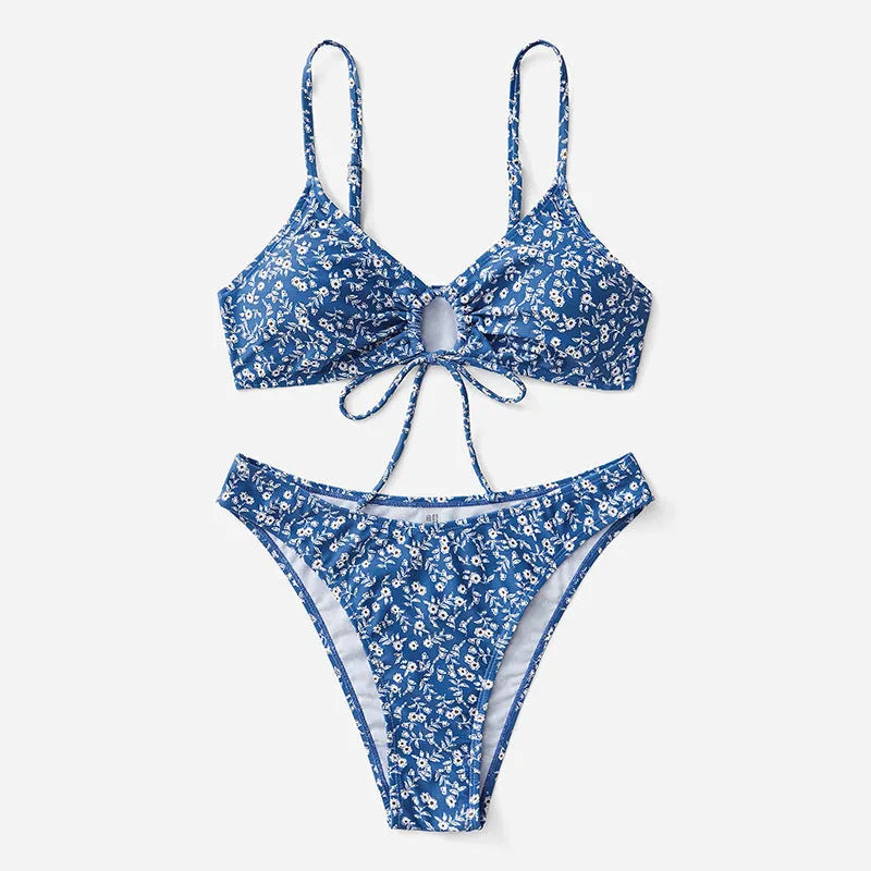 Blue women's polyester swimsuit three-piece set showing top and shorts, no steel rings.