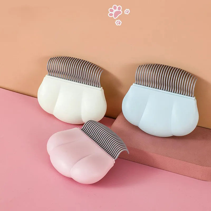 Paw Soft pet grooming brush tool for deshedding and dematting dogs cats bunnies in blue pink or white colours