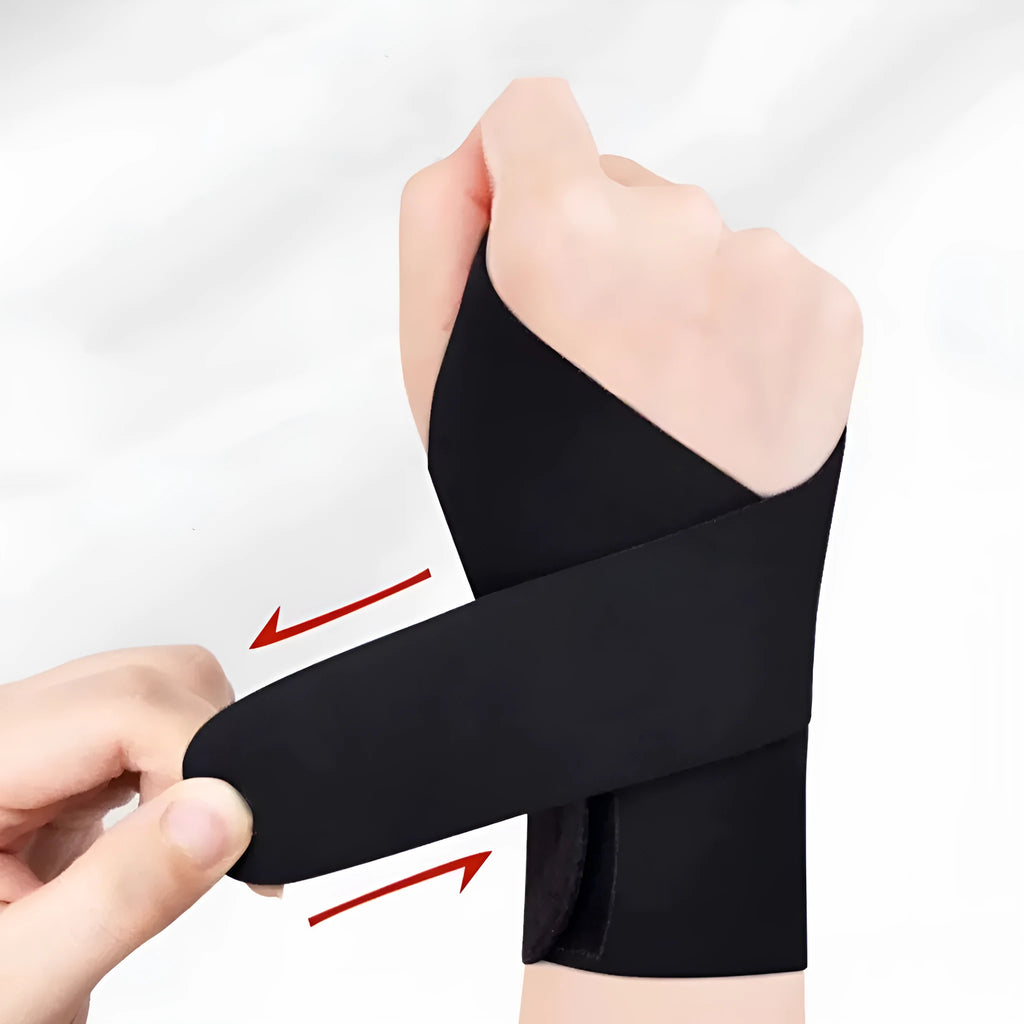 Adjustable black athletic wristguard shown on a wrist, suitable for sports like tennis and badminton.