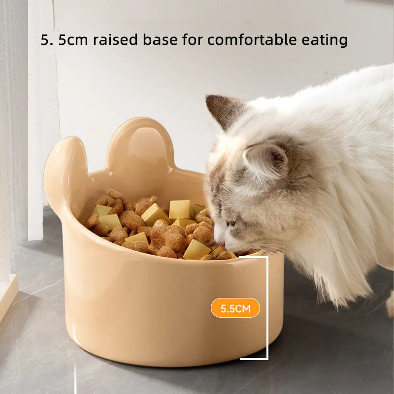 Ceramic pet feeding bowl set with neck protection design in white and brown animal patterns