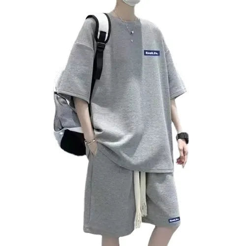 Waffle texture leisure sports suit with short sleeve top and matching shorts in blue