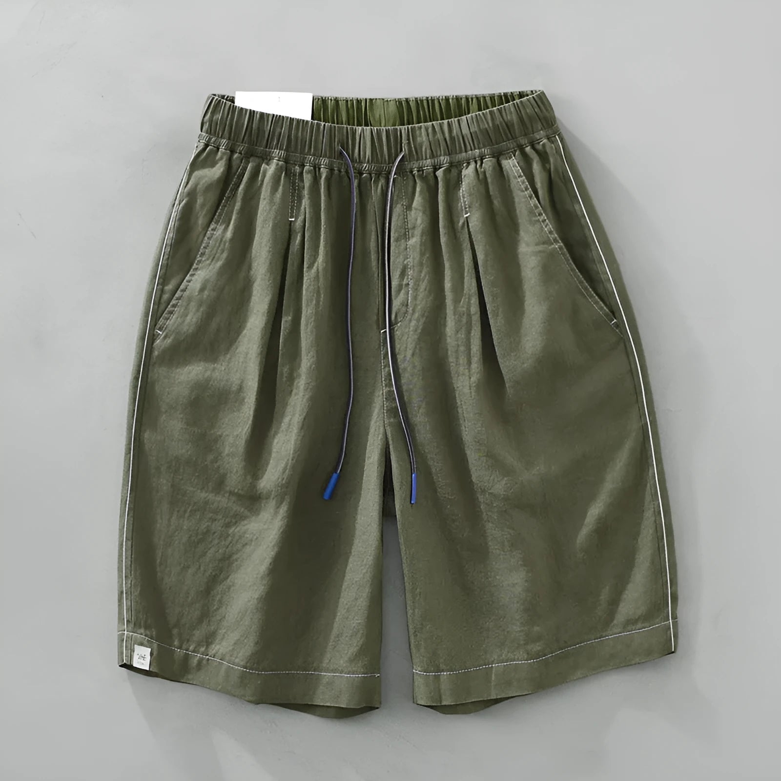 Men's linen shorts in straight drooping style with drawstring waist in black or green colour