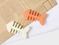 Minimalist fishbone design plastic barrette duckbill clip in a candy colour for side bangs.