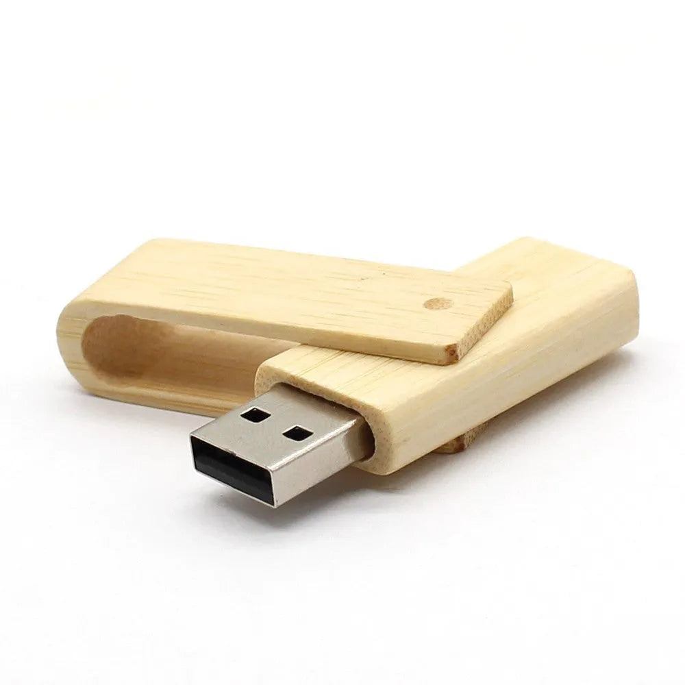 Pink wooden USB flash drive 2.0 with rotating clip, 60x19x8mm, on a plain background