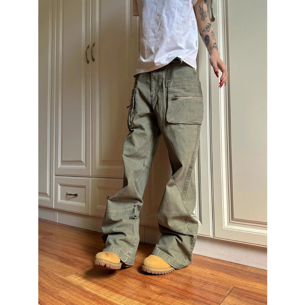 Green double zip cotton casual workwear trousers with a pocket, shown in a mid-waist fit.