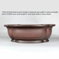 Handmade antique purple clay flowerpot in a crabapple shape, 74cm long.