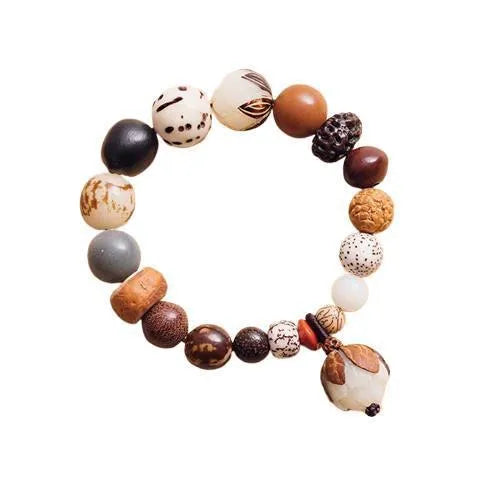 Handcrafted 18-seed Bodhi bead bracelet with geometric design on 16cm wrist