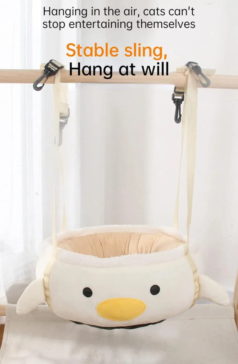 Green dinosaur-shaped cat bed with a chick inside, shown both flat and hanging as a hammock.
