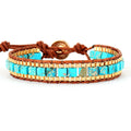 Blue hand-woven leather bracelet with geometric pattern on neutral background