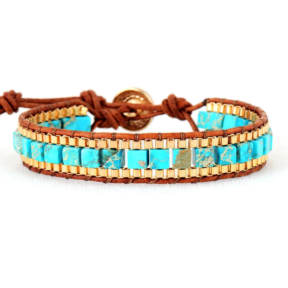Blue hand-woven leather bracelet with geometric pattern on neutral background