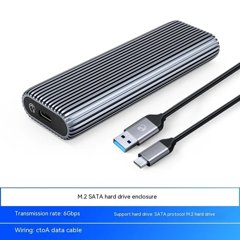 Aluminium external SSD enclosure box for M.2 NVMe and SATA drives with data cable and heat dissipation accessories.
