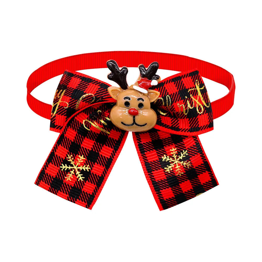 Christmas pet bow tie decoration in British style with red and green patterning