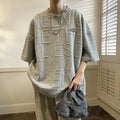 Men's grey t-shirt with raised black letter print, short sleeves, loose fit