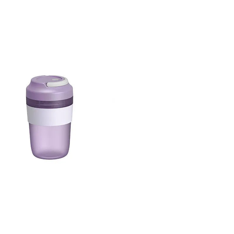 Grape purple portable USB blender cup with lid, showing stainless steel blades inside 400ml capacity bottle.