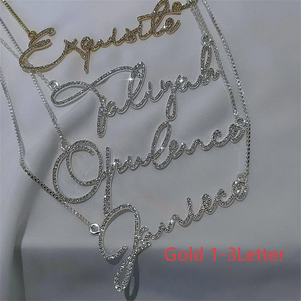 Stainless steel name necklace with diamond-studded letters on an adjustable chain in silver, gold or rose gold.