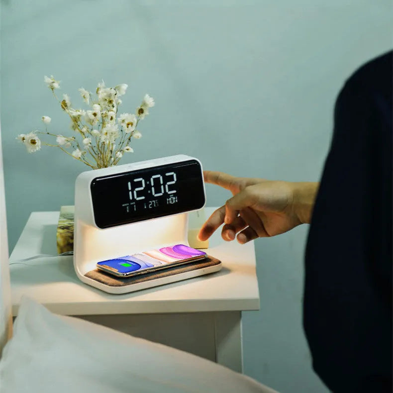White 3-in-1 bedside lamp with wireless charging pad, LCD screen clock, and touch dimming.