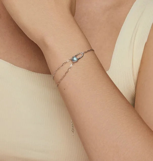 S925 sterling silver heart lock bracelet on display with electroplated finish