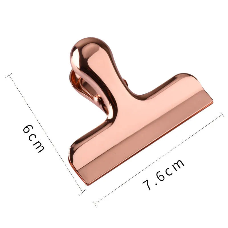 Gold stainless steel dovetail clip on white paper, 7.6x6cm, 430 steel, vacuum-plated finish