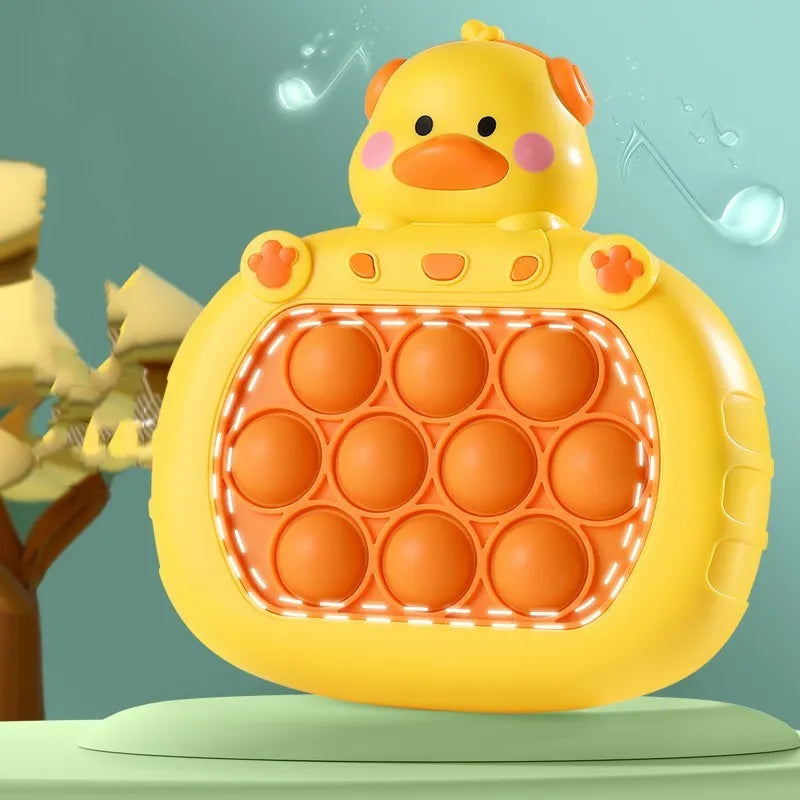 Quick push game console Little Yellow Duck style with charger and rechargeable battery, plastic and silicone construction, 11.5x5.5x13cm