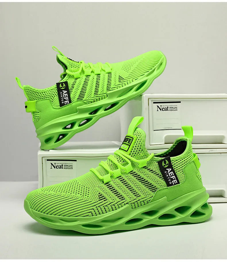 Men's mesh casual running shoes in black with cross strap detailing and lace-up closure