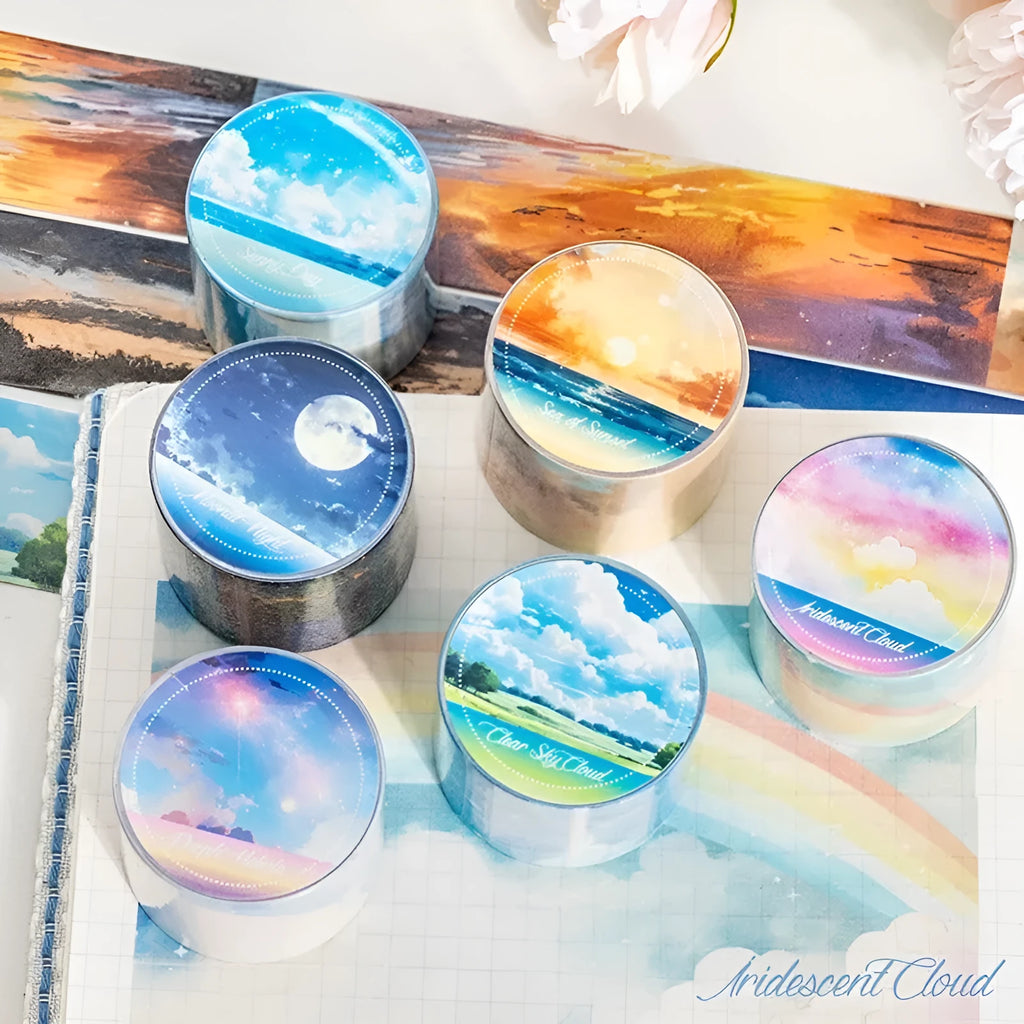 Roll of Japanese paper sky theme washi tape showing colourful clouds design, 30mm wide.