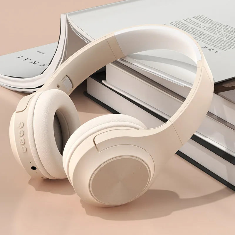 Wireless Bluetooth headphones in chalk black, ivory white, and youth green colours with creative design