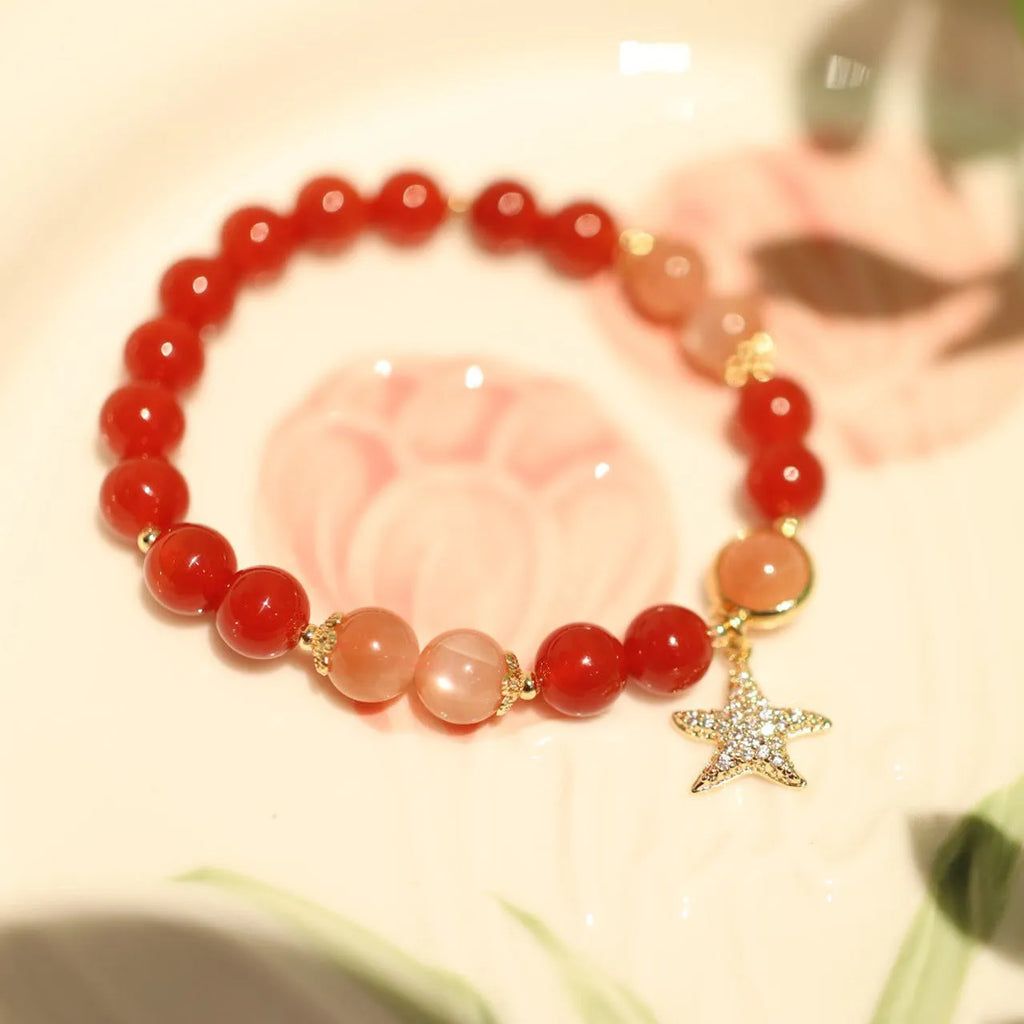 Handmade red agate bracelet with 8mm sands orange sunstone beads and star xiangyun ethnic design