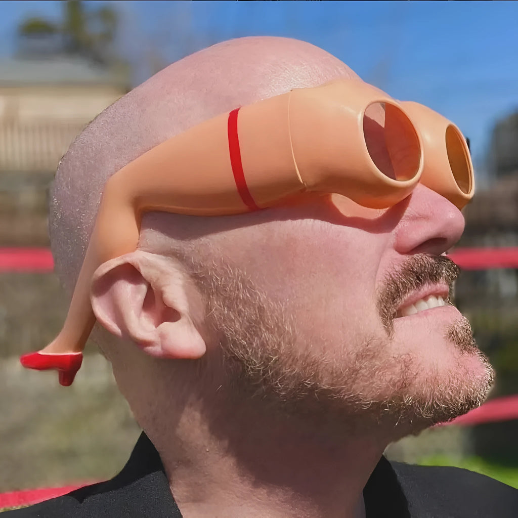 Oversized orange plastic leg hip sunglasses with a novelty personality style design.