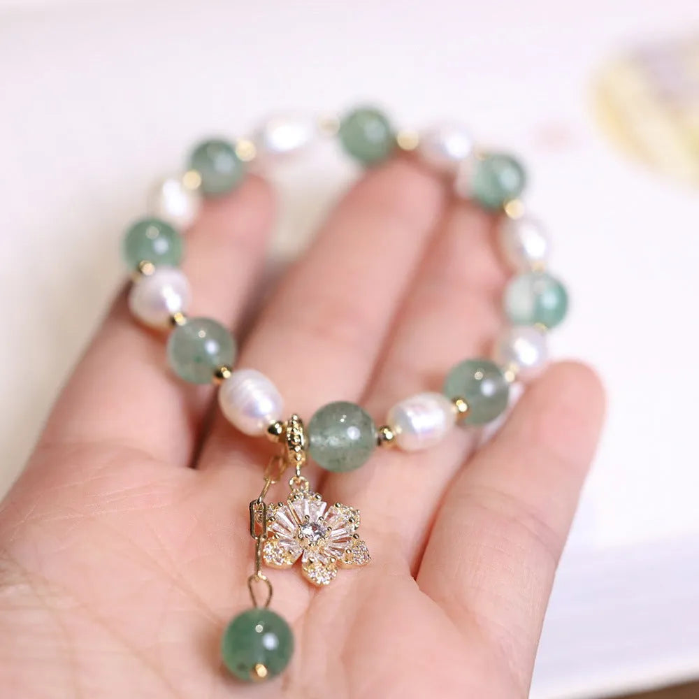 Green strawberry freshwater pearl bracelet with Chinese knot design and jade flower decorations
