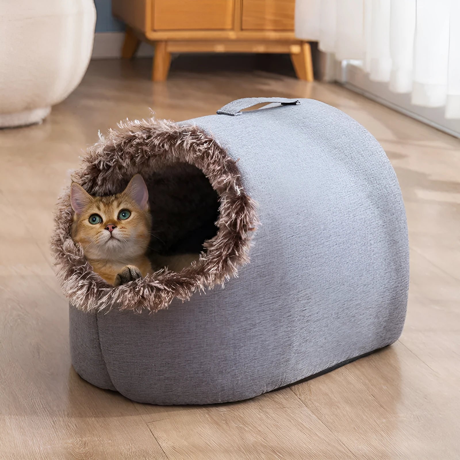 Fleece-lined enclosed cat bed with sleeping bag design shown in grey and brown colour options