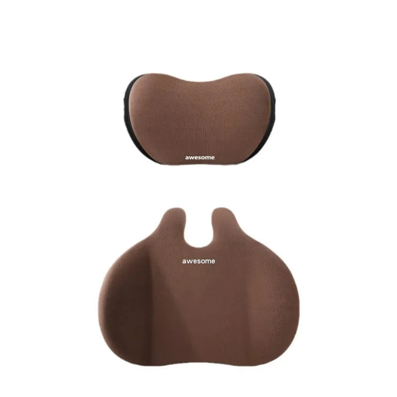 Cow head design car headrest pillow and matching lumbar support cushion set on a car seat.