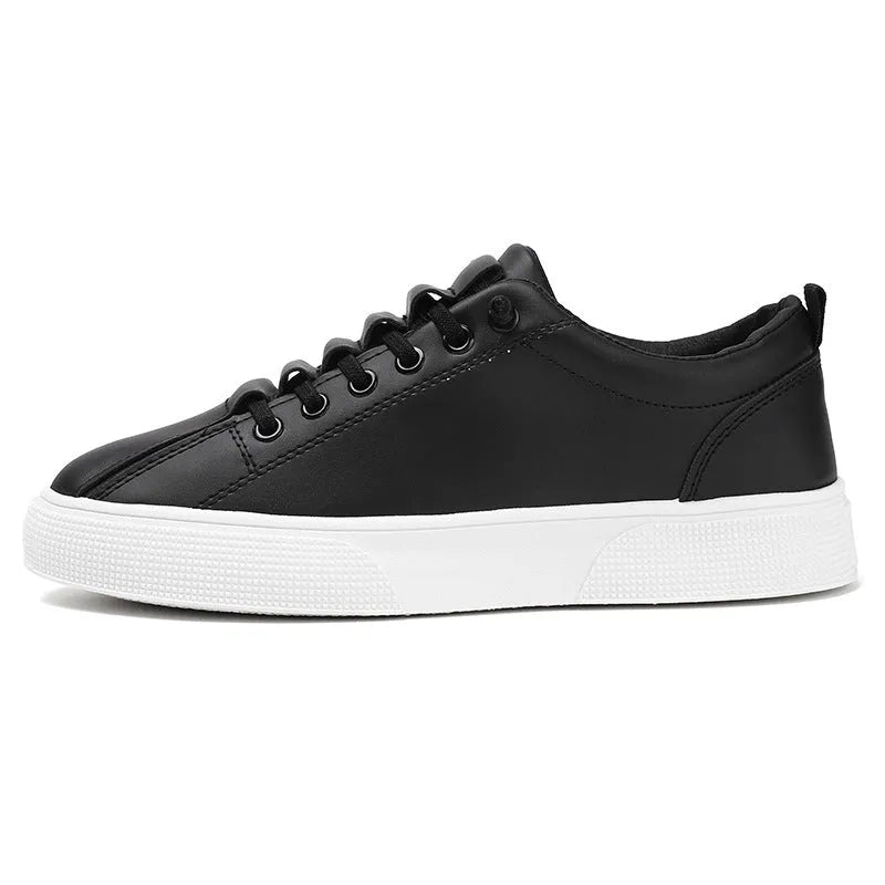 Men's black and white low top sports shoes with synthetic leather upper, mesh panels, and a flat PVC sole.
