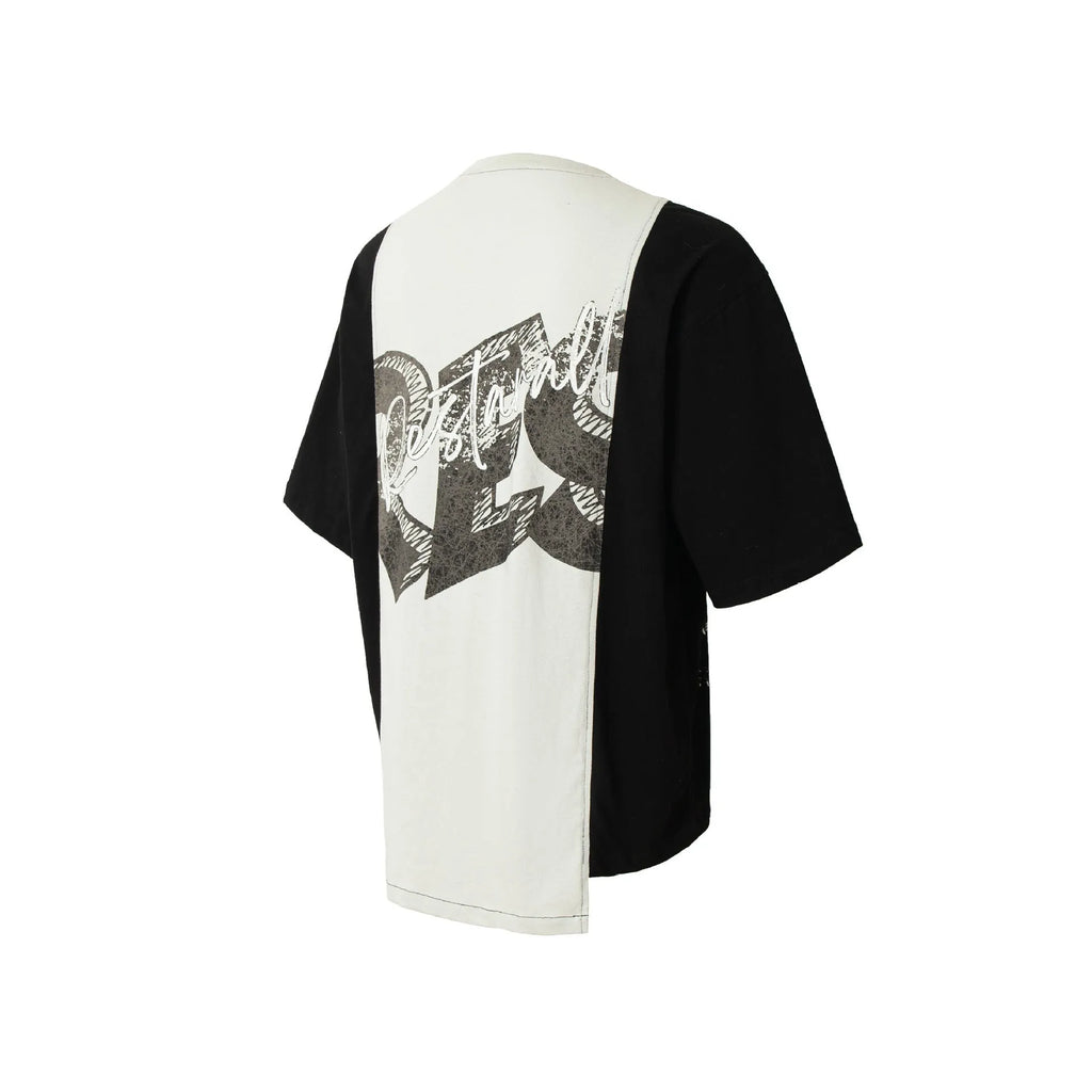 Black and white deconstruction printed t-shirt with loose fit and short sleeves
