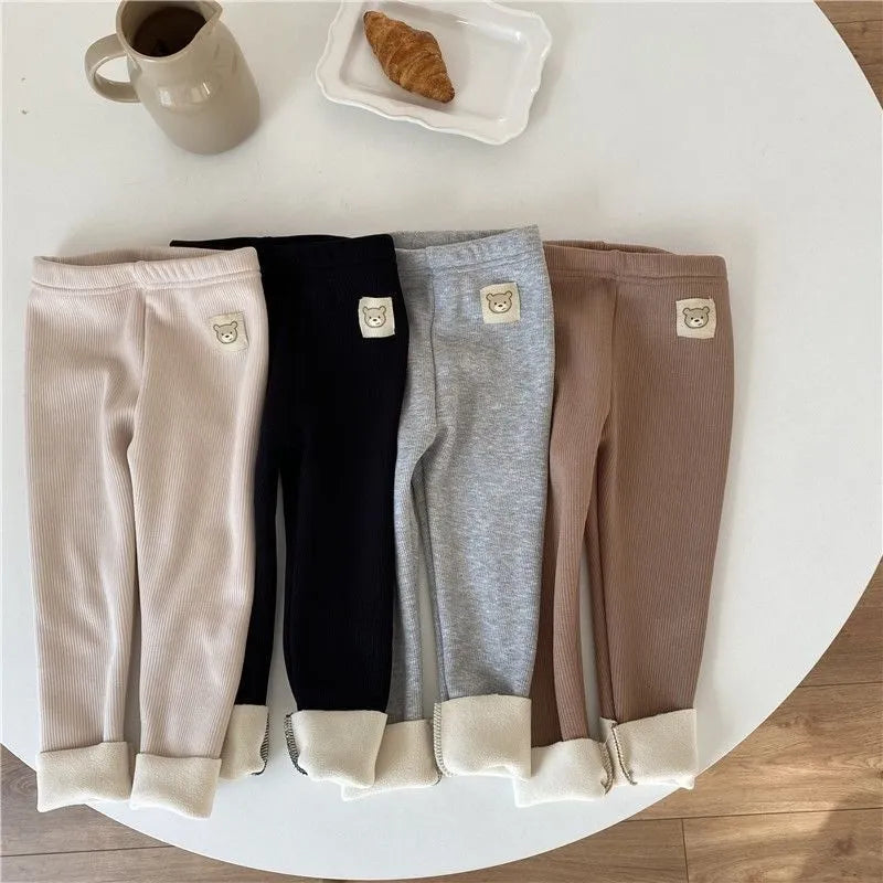 Girls' high-waisted fleece-lined leggings in beige, black, brown, and grey colours with a wool lining.