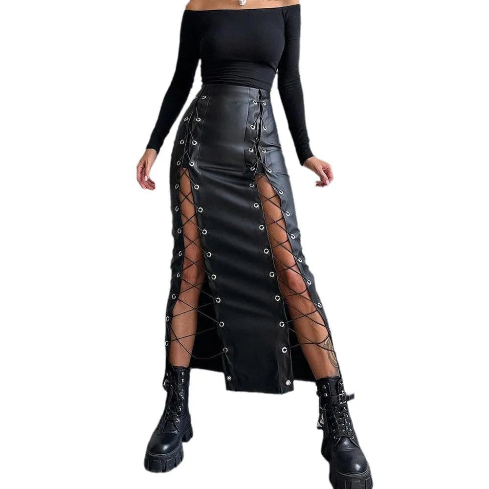 Women's black PU pencil skirt with slit and lacing detail, standing pose