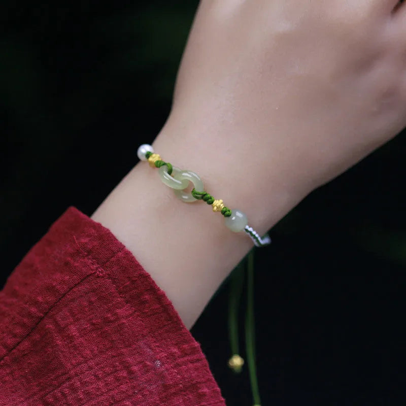 Natural Hetian jade woven bracelet with hollow-out design on flexible wire with silver or gold-plated elements