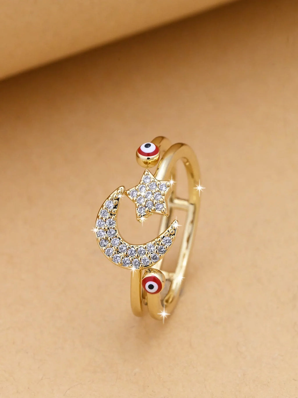 Devil's Eye open copper ring with electroplated finish, geometric eye design, shown in red, blue and white options