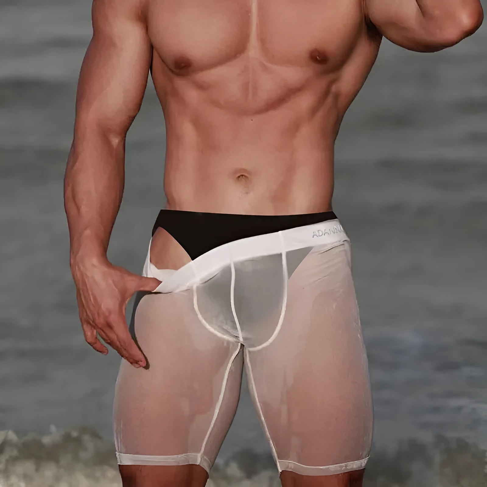 Men's mesh home shorts in black nylon fabric with seamless construction
