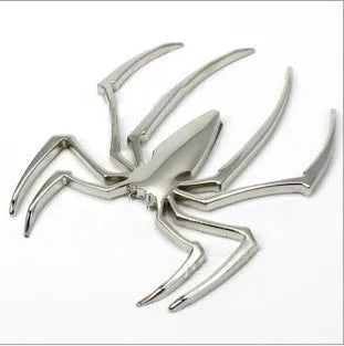 Three-dimensional zinc alloy spider emblem sticker in gold, measuring 7cm by 5cm.