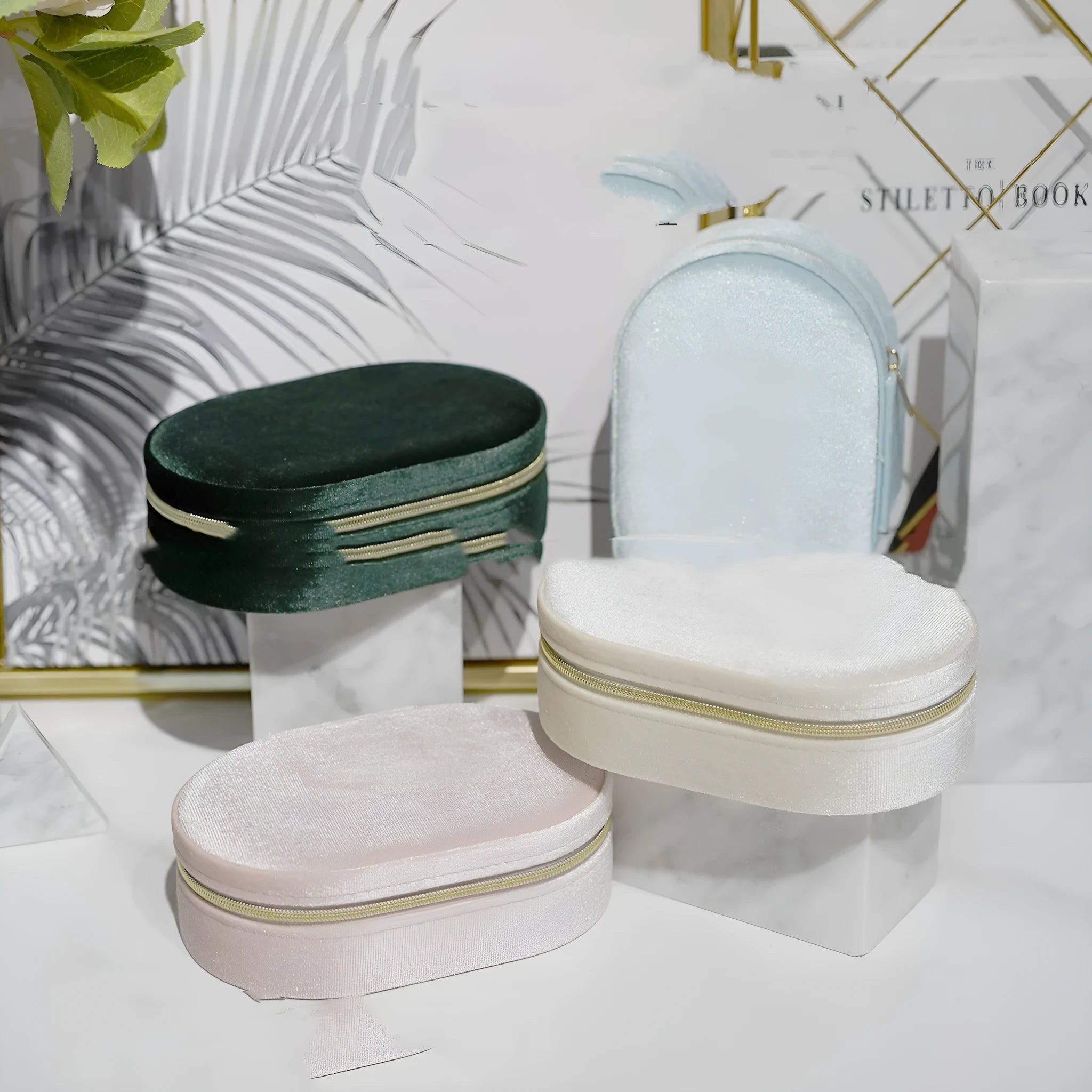 Oval velvet jewellery storage box with flannel lining in various colours, showing dimensions of 15cm by 10cm.