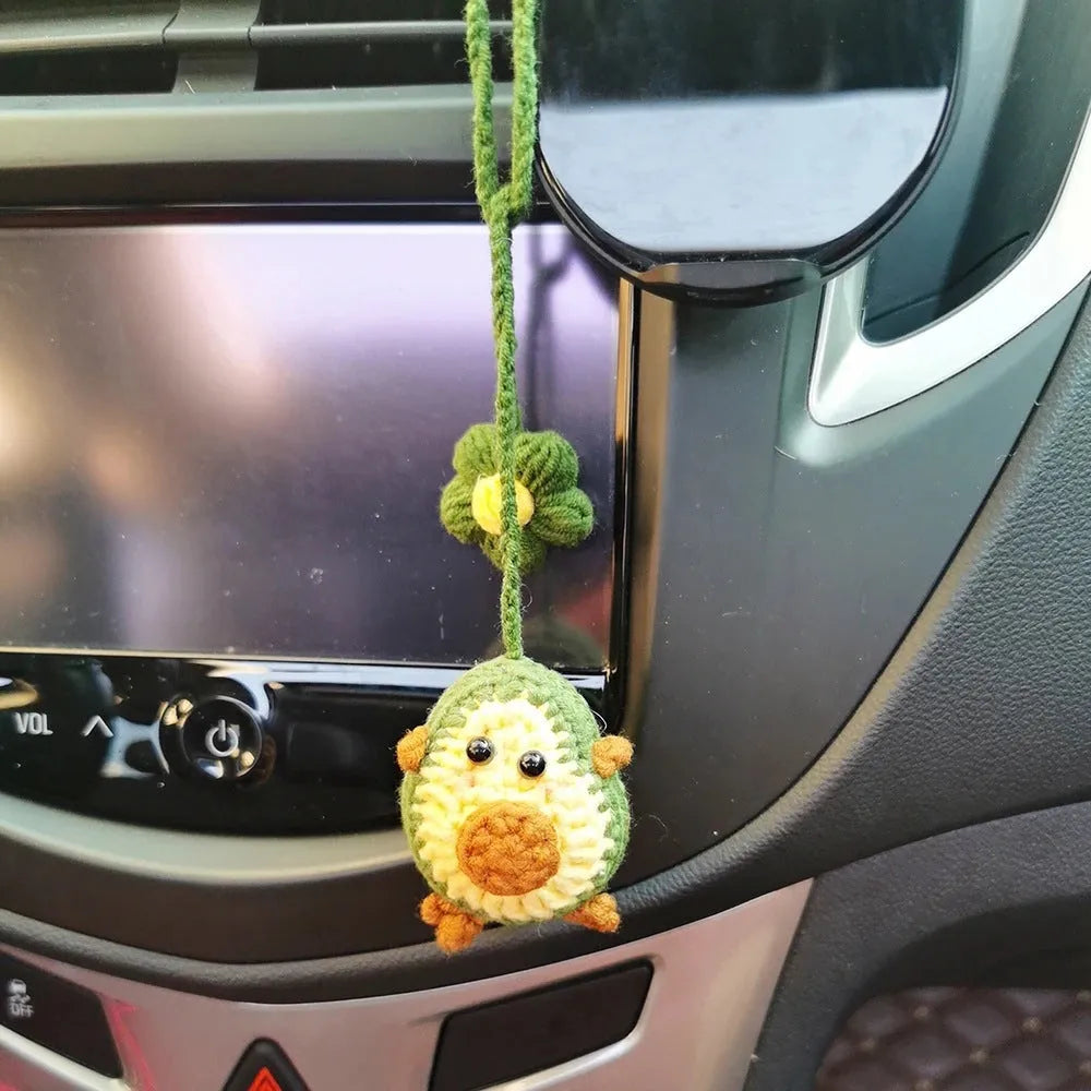 Handmade crocheted avocado rainbow flower car pendant made from wool yarn.